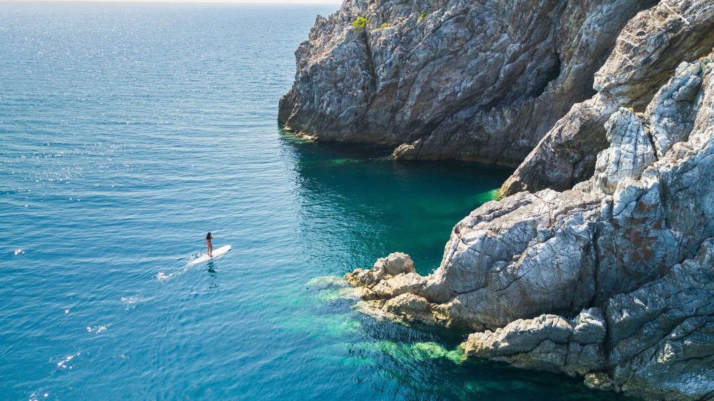 Paddle Boarding Through Liquid Glass, Wa Ale