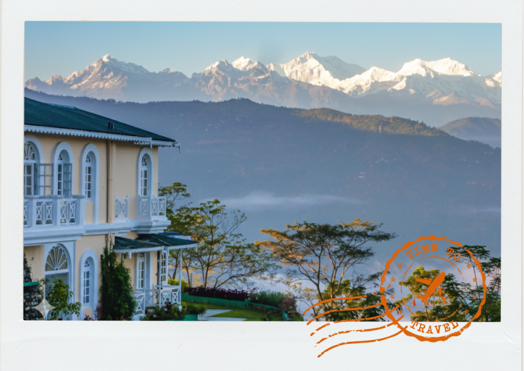 From the layered energy of Kolkata, the land rises gradually toward the cool hills of Darjeeling. At Glenburn Tea Estate, tea gardens sweep across emerald slopes, and Kanchenjunga lingers quietly on the horizon.