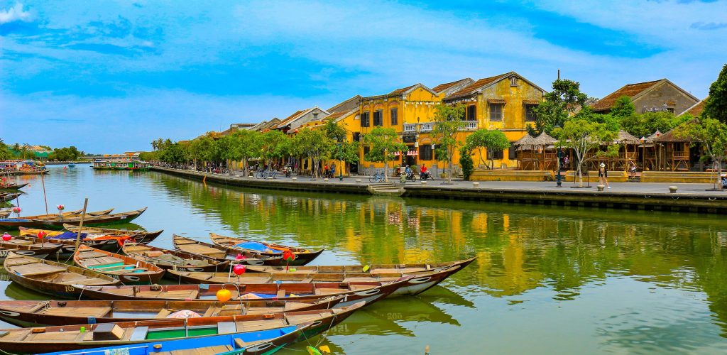 Hoi an, historic UNESCO town in Vietnam. City by the habour with traditional yellow buildings.